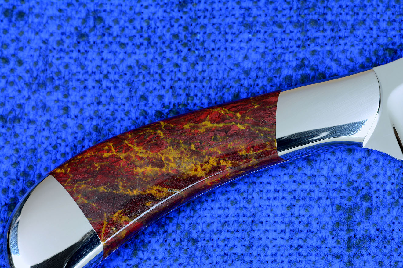 "Sonoma" professional chef's knife, obverse side view in 440C high chromium stainless steel blade, 304 stainless steel bolsters, Pilbara Picasso Jasper gemstone handle, hand-tooled burgundy leather shoulder sheath